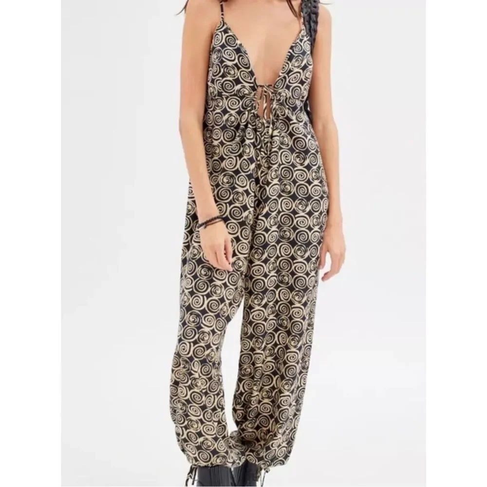 0065 Urban Outfitters Spiral-Print Deep V Jumpsuit in Black & Cream